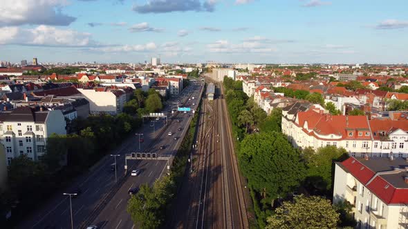 Normal working traffic in the morning in Berlin.Unbelievable aerial view flight sinking down drone