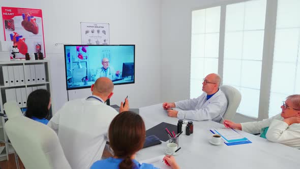 Medicine Staff Having Videoconference of Hospital Team with Expert Doctor