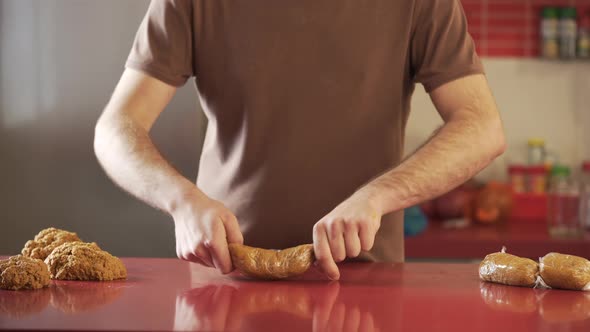 Man making vegan meat. Process, how to cook seitan