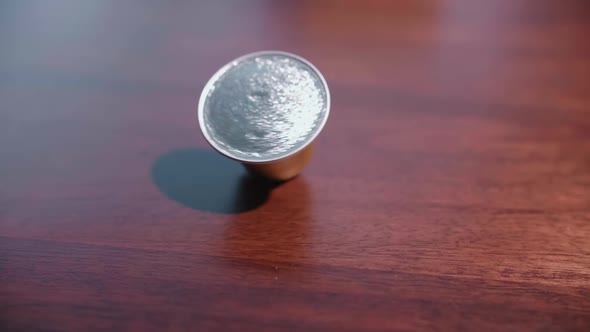 Coffee Pod Falling In Slow Motion