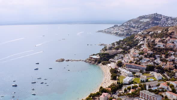 Aerial of Famous Coastal Mediterranean Town of Roses Spain