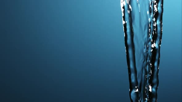 Water pouring and splashing in ultra slow motion 1500fps on a reflective surface - WATER POURS 