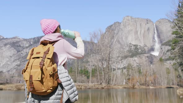 Young Inspired Woman Standing Mountain Lake or River Enjoying Drinking Hot Tea