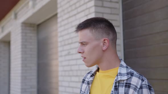 Mixed Feelings of Young Man Yellow Tshirt