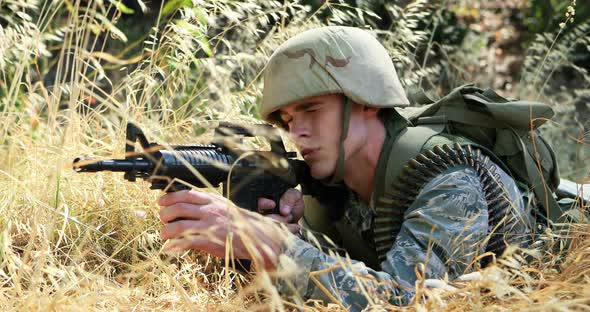 Military soldier during training exercise with weapon