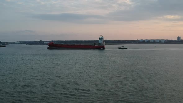 tanker boat sailing past with a tug