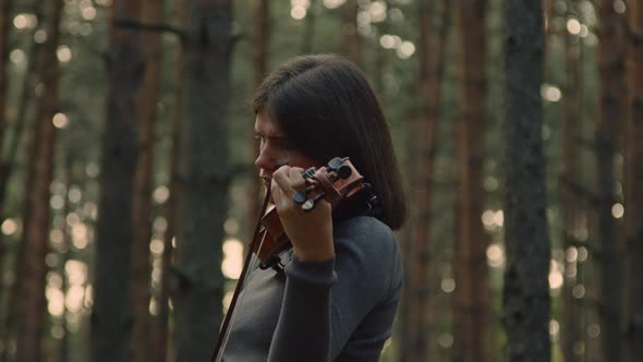 Lonely Lady Is Playing Violin