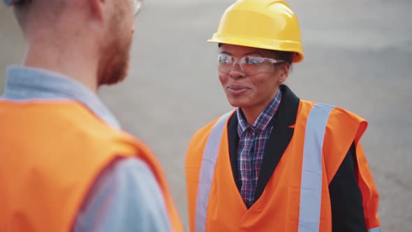 Happy engineers discussing a working project