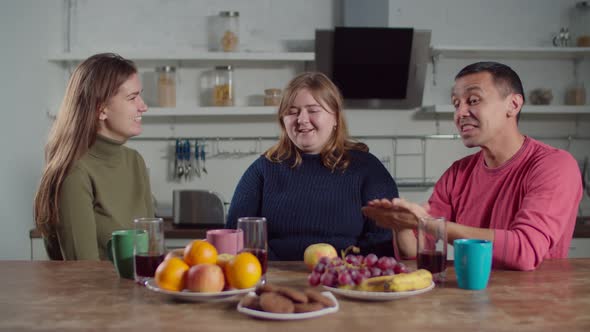 Woman Learning Sign Langauge with Deaf Friends