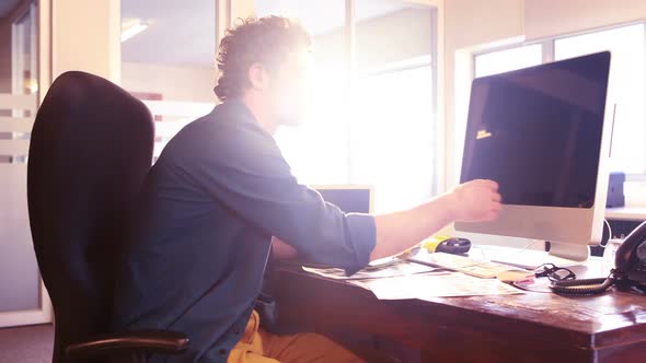 Graphic designer working on computer