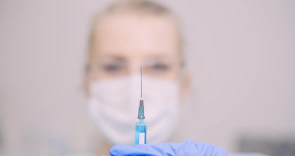 Researcher Working in Lab - Scientist Holding