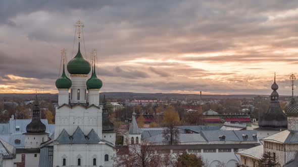 View of the Church of the Resurrection in Rostov Kremlin in front of a colorful sunset
