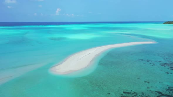Aerial drone shot scenery of beautiful lagoon beach vacation by aqua blue sea and white sandy backgr
