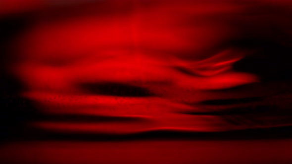 Super Slow Motion Macro Abstract Shot of Swirling Red Wine in Glass at 1000Fps