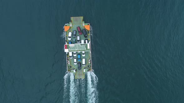 Aerial View From Above To Kotor Bay and Regular Ferry for Cars and Passengers From Lepetane To