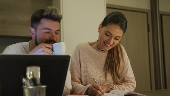Couple working together from home