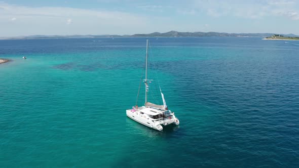 Drone Footage Aerial Top View of Catamaran Sailing in the Open Sea