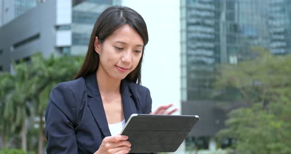 Asian Businesswoman use of tablet computer 