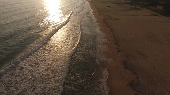 Aerial Drone View of Tropical Beach Ocean Waves Reaching Shore