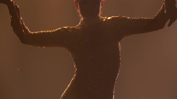 Theatrical Dance Show. Actress, Dressed As the Queen of Ancient Egypt, Dances in a Dark Studio