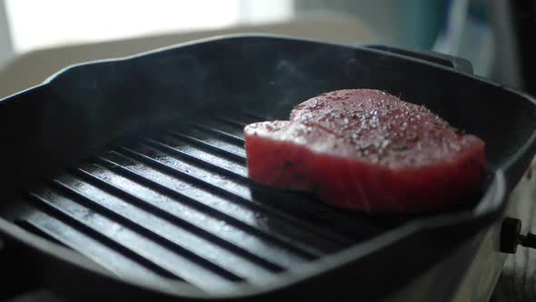 Pan-fried Fish, The Tuna Fillet on the Steaming Frying Pan, Close-up