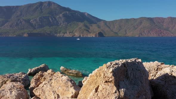 Cruise Ship Sailing on Sea Bay with Mountains in the Background