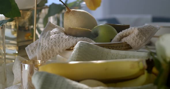 Kitchen Still Life Which Consists of Pear Green Apple and Two Halves of a Kiwi Lying on the Kitchen