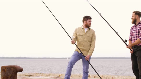 Happy Friends with Fishing Rods on Pier 55