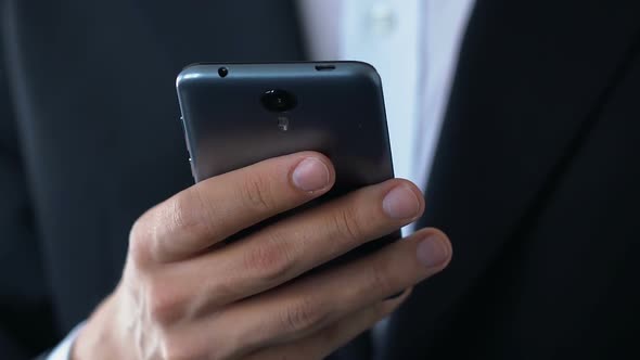 Hand of Businessman Holding Smartphone Checking Personal Mail Box, Technology