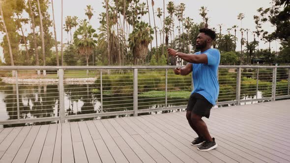 Athlete man working out in the park