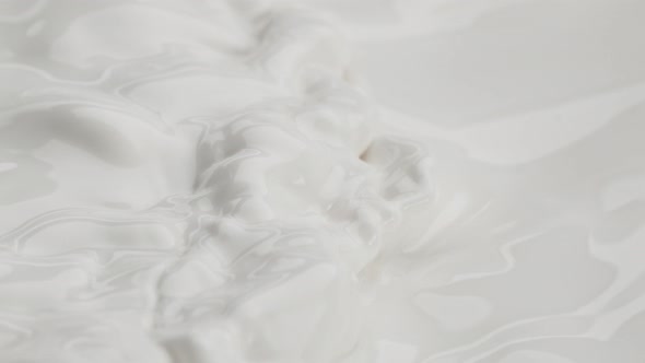 Super Slow Motion Shot of Waving Fresh Cream at 1000 Fps