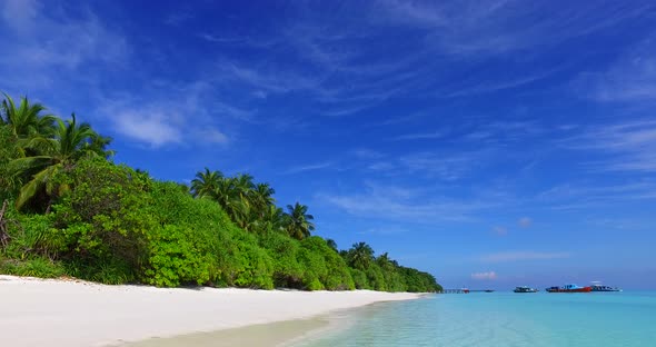 Tropical drone abstract view of a sunshine white sandy paradise beach and aqua blue water background