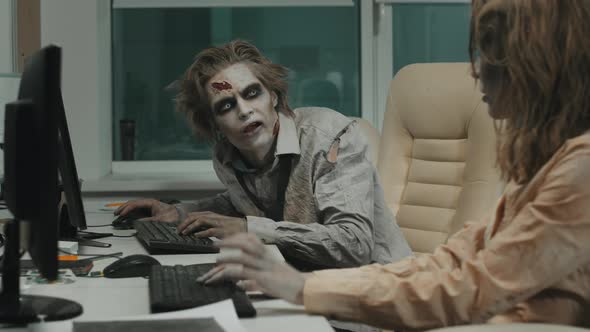 Mindless Zombies Working in Office