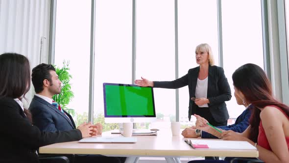 Business People in the Conference Room with Green Screen