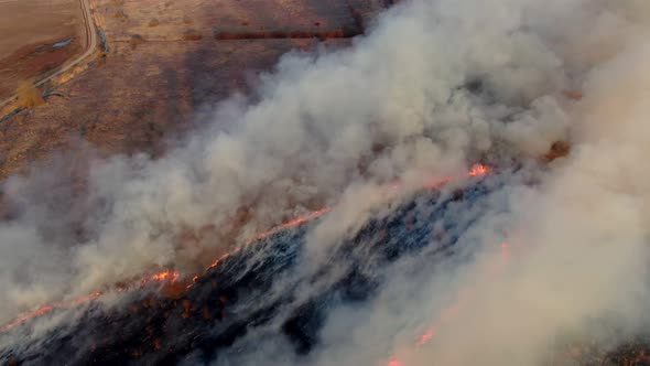 Epic Aerial View of Smoking Wild Fire