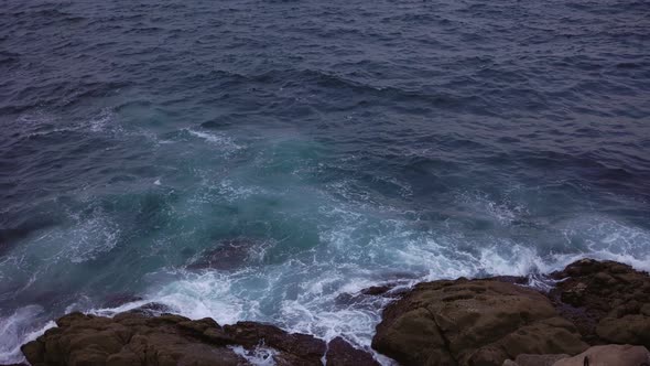 the Rocky Coast of the Calm Ocean