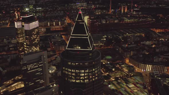 AERIAL: Messeturm in Frankfurt Am Main, Germany at Night, Big City, Lights, Skyscraper