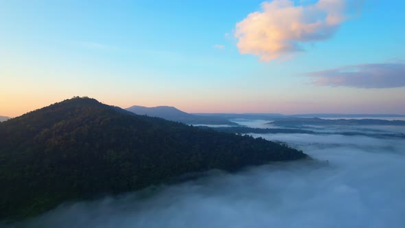 4K Aerial view of Mountains landscape with morning fog.