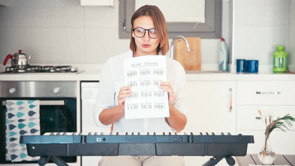 Young Adult Woman Music Teacher Recording Video for the Online Course