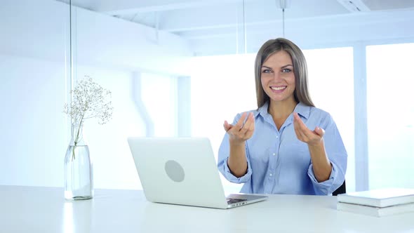 Young Woman Inviting Customers with Both Hands