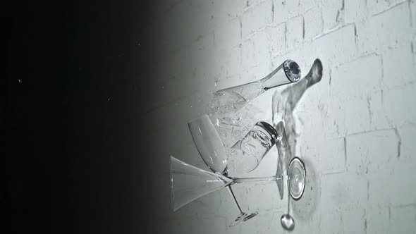 Drinking glasses shattering on the wall, Slow Motion