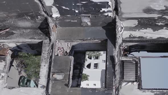 Vertical Video of the Consequences of the War in Ukraine  a Destroyed Building