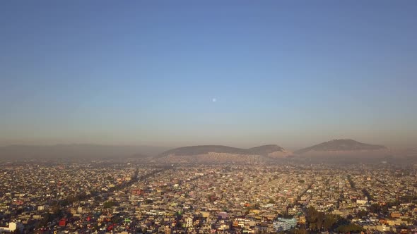 Mexico city aerial drone shot, sunrise with contamination