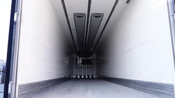 Motion Inside Empty Workbody of Truck Transporting Food