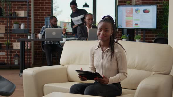 Portrait of Businesswoman Working on Internet with Digital Tablet