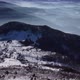 Drone view of snowy mountain landscape on a winter sunny day - VideoHive Item for Sale
