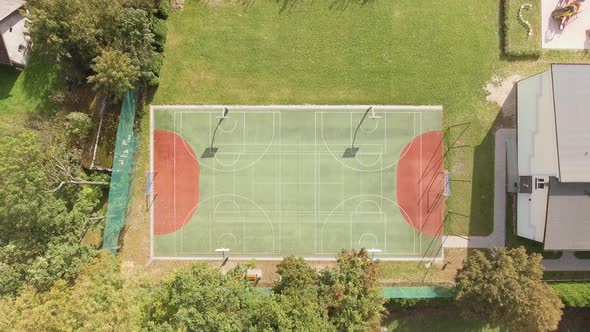 Top down aerial shot of a multifuncional field and playground