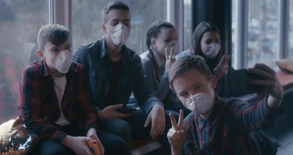 Face Mask Wearing Students Taking Selfie