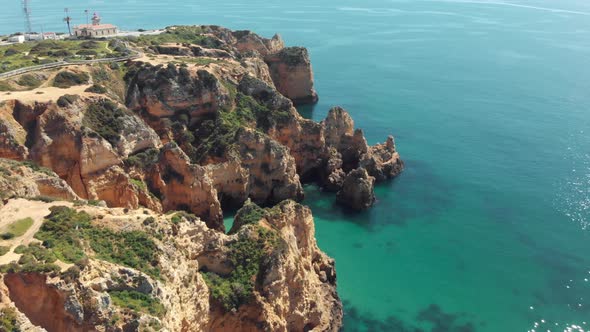 West side of scarp cliff in Ponta da Piedade at midday, Lagos, Algarve, Portugal