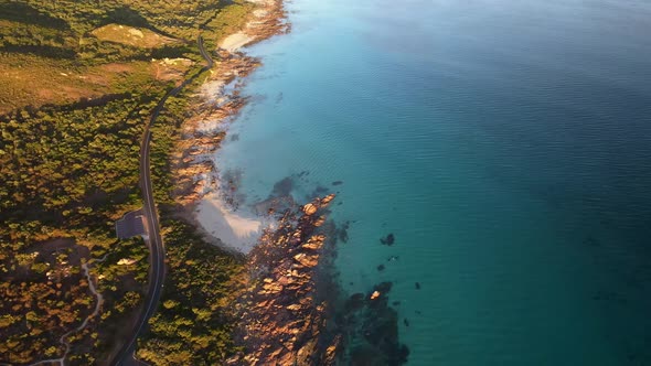 Early morning light on eagle bay aerial footage flying forward